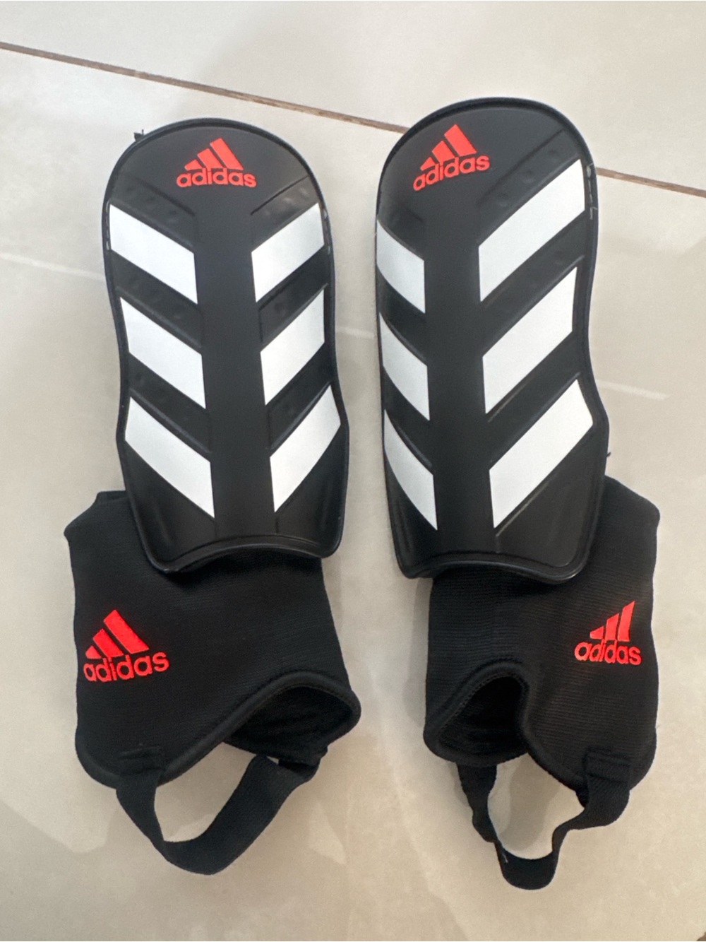 adidas Black and White Shin Guards with Red Logos